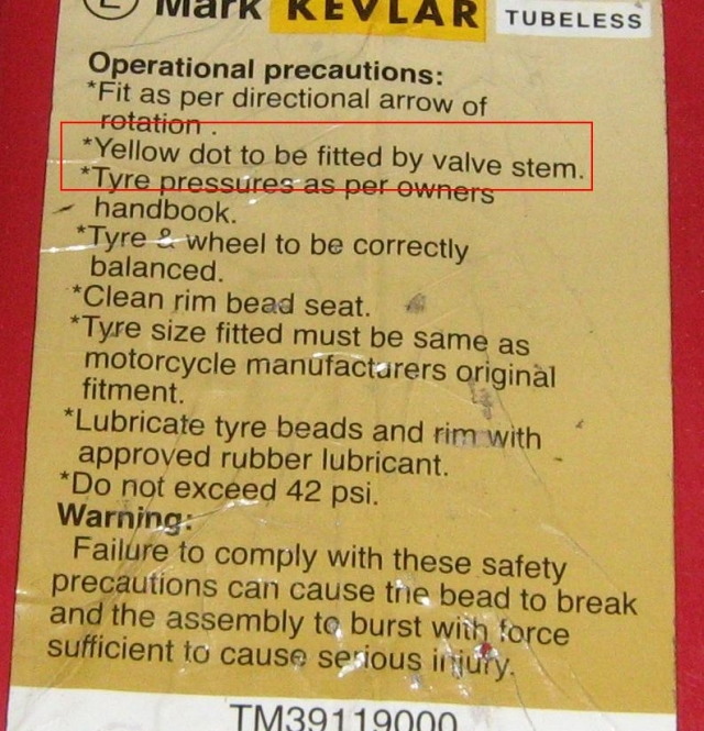 The sticker showing various instructions including information about the yellow dot
